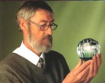 Colin Terris examines a paperweight